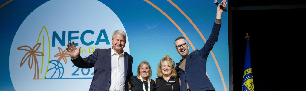David Meade on stage at NECA 2024 in San Diego, celebrating with industry leaders and the executive team after delivering a high-energy keynote.